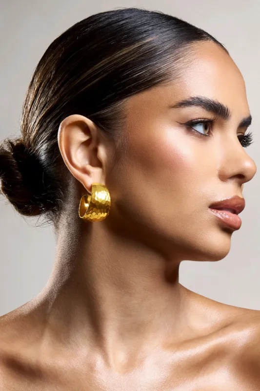 Crush | Gold Hammered Hoop Earrings sold by Club L London