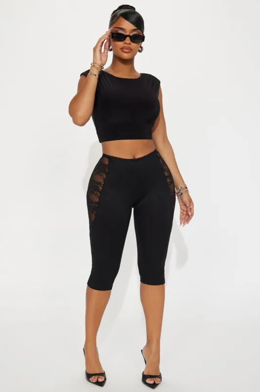 Beneath The Thorns Lace Capri Legging - Black sold by Fashion Nova