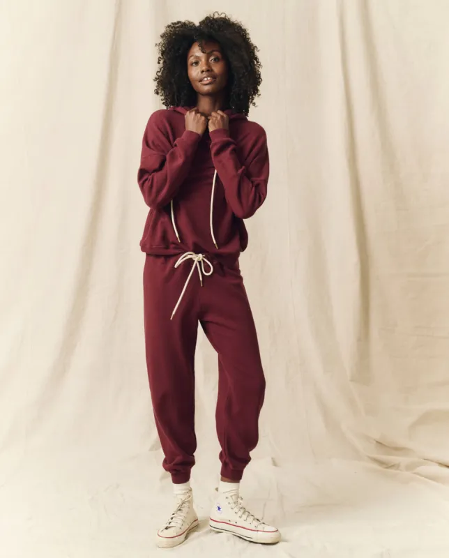 The Cropped Sweatpant. Solid -- Mulled Wine sold by THE GREAT.