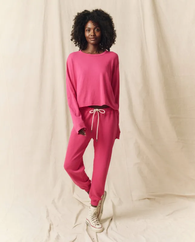 The Cropped Sweatpant. Solid -- Fuchsia sold by THE GREAT.