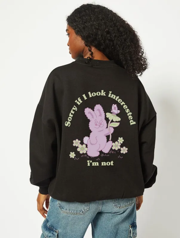 Sorry If I Look Interested Sweatshirt in Black sold by Skinnydip London