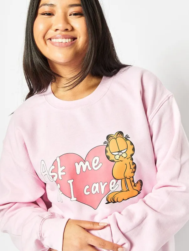 Garfield x Skinnydip Ask Me If I Care Sweatshirt in Pink sold by Skinnydip London