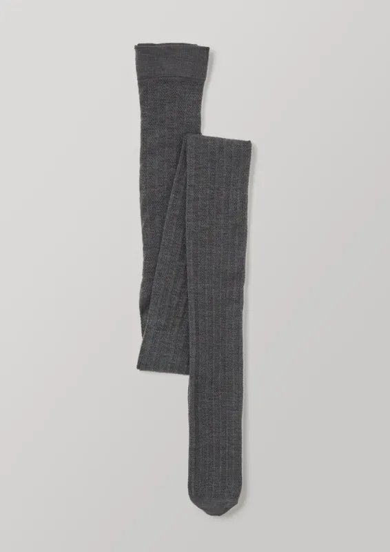 Swedish Stockings Fishbone Tights | Anthracite Melange sold by TOAST