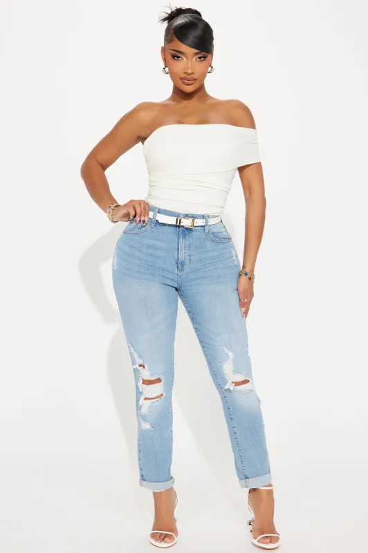 Most Important Ripped Stretch Mom Jeans - Light Wash sold by Fashion Nova