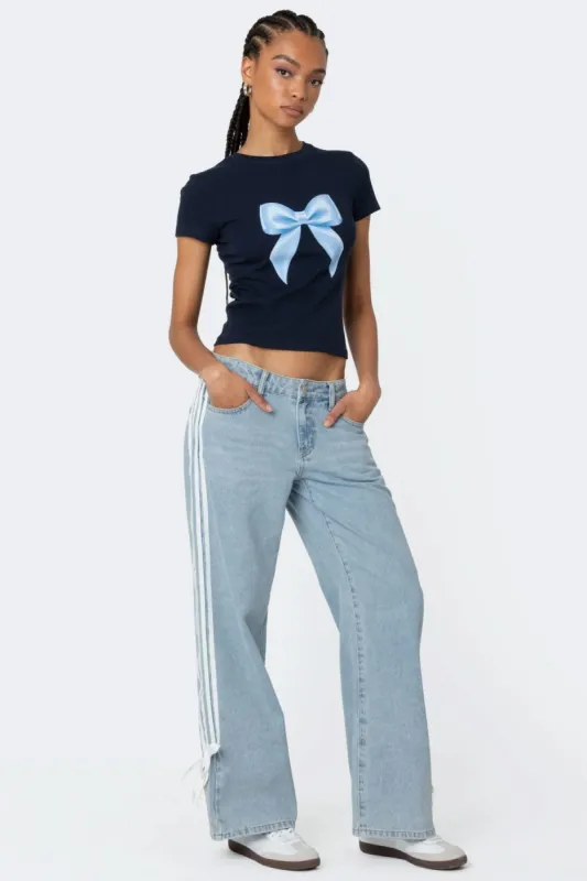 Washed Low Rise Ribbon Jeans sold by Edikted