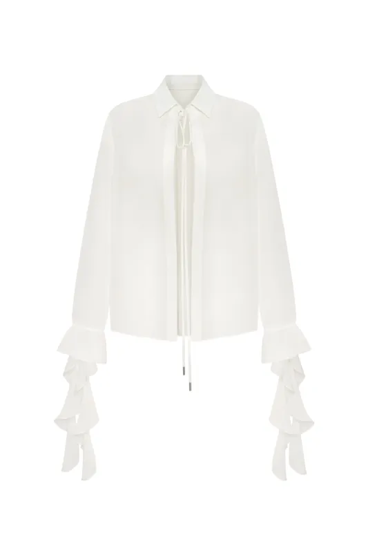 Ruffled blouse in white, Xo Xo sold by Milla