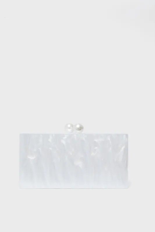 Pearl Acrylic Clutch sold by Tuckernuck