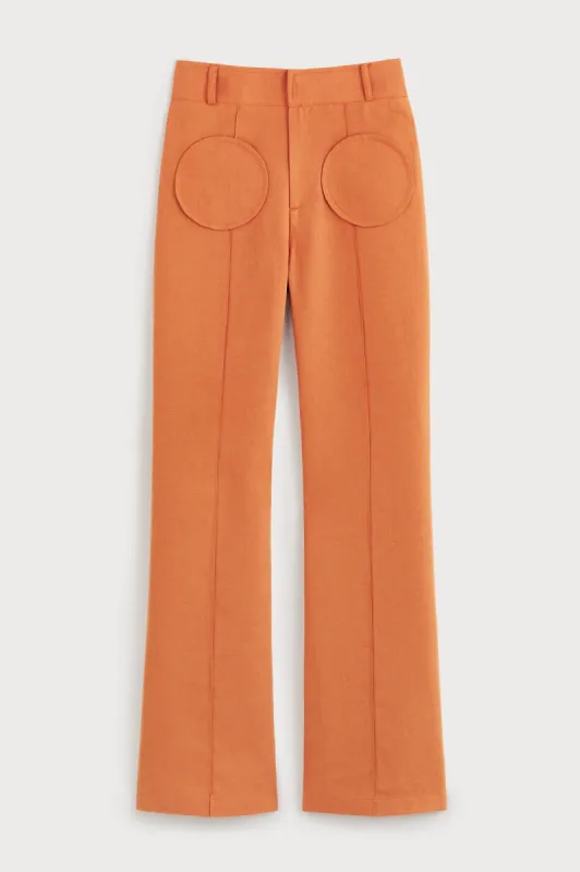 Orange flared pants sold by DESTREE