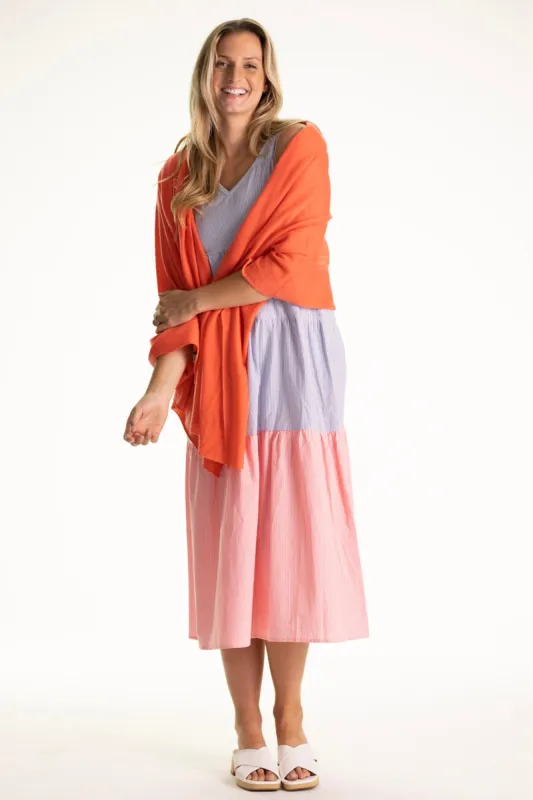 The 100% Cashmere Ryan Wrap in Coral sold by Duffield Lane