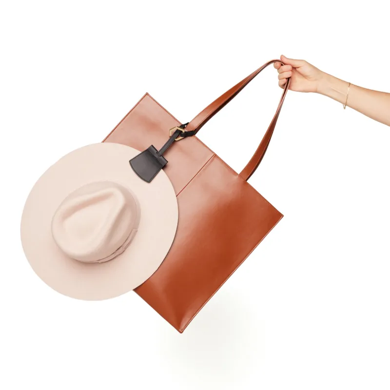 The Wrap TOPTOTE Hat Clip sold by The Fileist