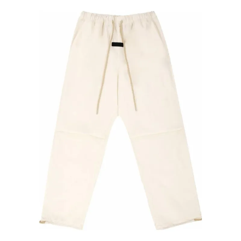 Fear of God Essentials FW23 Relaxed Trouser 'Cloud Dancer' 130BT232081F sold by KicksCrew