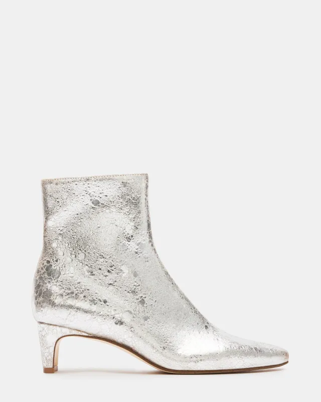 DELVIE SILVER LEATHER sold by Steve Madden