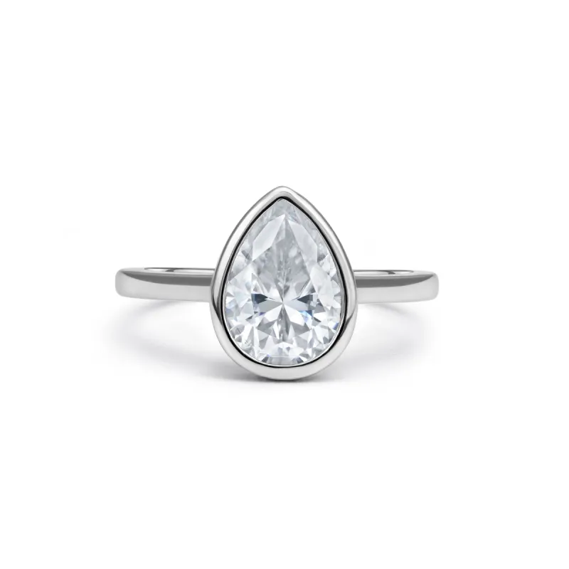 Solitaire Bezel Pear Cut Moissanite Ring sold by Ghetluxe