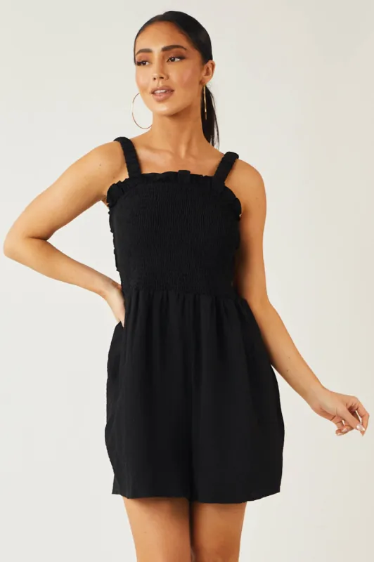 Black Smocked Elastic Strappy Back Woven Romper sold by Lime Lush