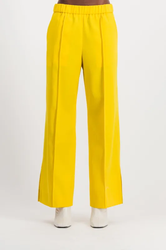 Loose leg wool gabardine pants sold by Renaisa