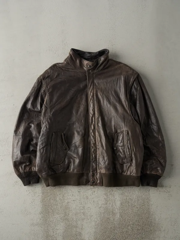 Vintage 80s Brown Boundary Waters Leather Bomber Jacket (L) sold by Rebalance Vintage