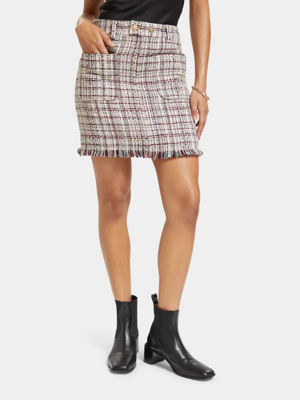 Boucle tweed mini skirt sold by Scotch and Soda