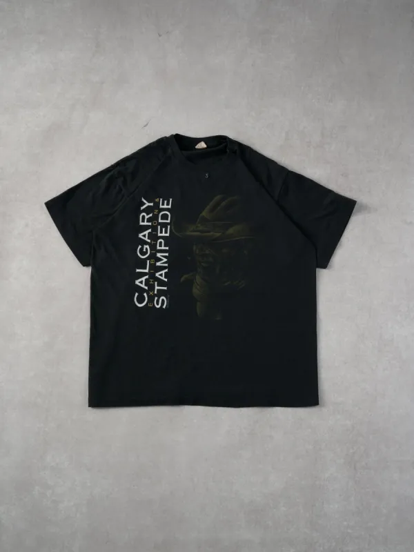 Vintage 94' Black Calgary Stampede Graphic Tee (M) sold by Rebalance Vintage