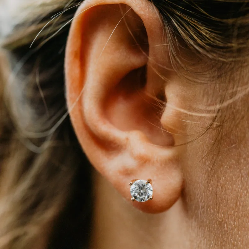 The Aria Earrings | Round Lab Diamond Twist Four Claw Solitaire Studs sold by Ethica Diamonds