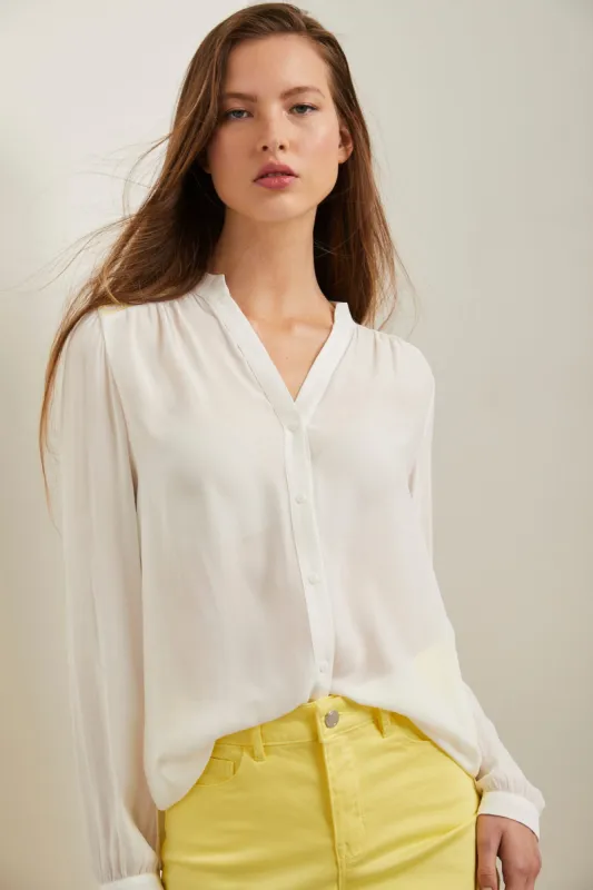 Puffy sleeve shirt with ruching sold by Tristan Style