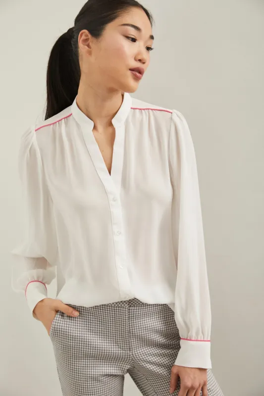 Puffy sleeve blouse with piping detail sold by Tristan Style