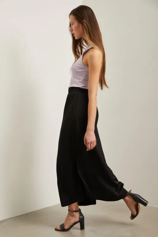 Long skirt with side slits sold by Tristan Style