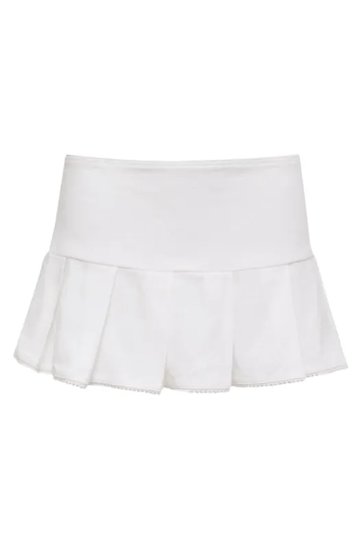 THE GRACE PLEATED MINI SKIRT IN IVORY sold by Bella Venice