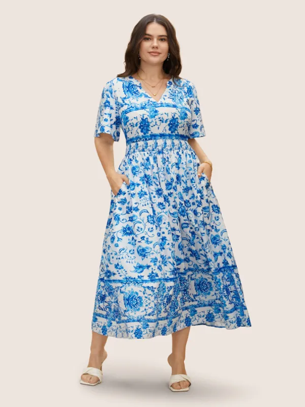 Notched Collar Boho Print Shirred Dress sold by Bloomchic