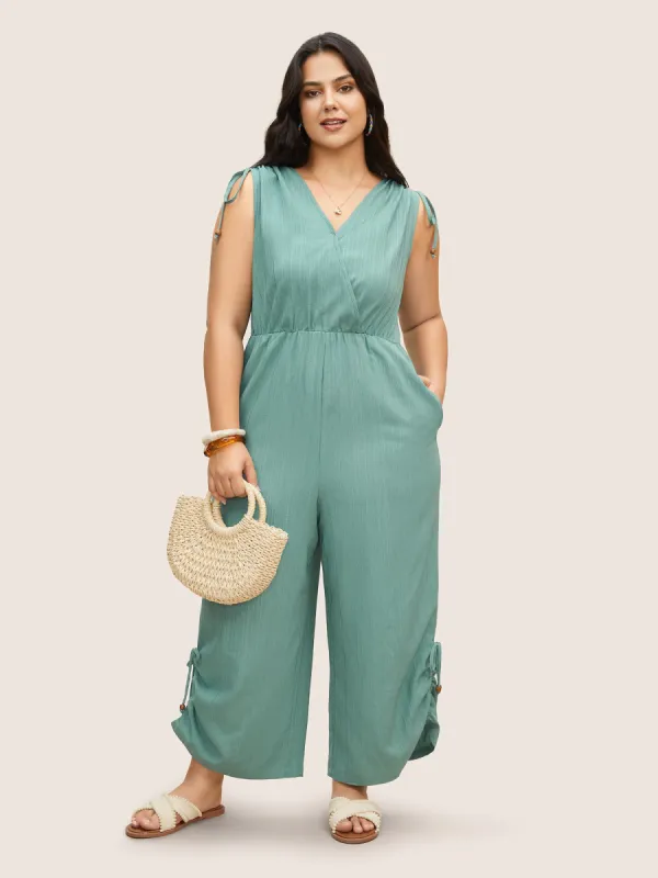 Plain Textured Surplice Neck Drawstring Jumpsuit sold by Bloomchic