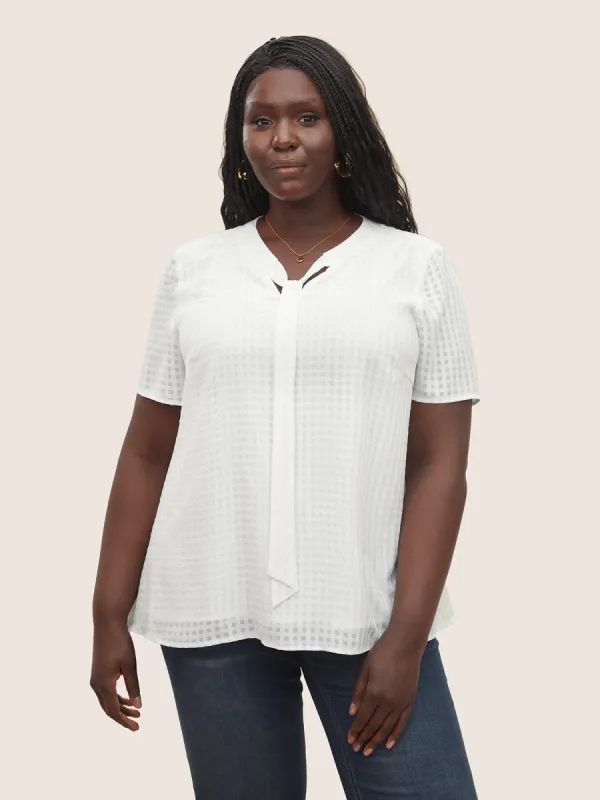 Solid Textured Chiffon Mesh Tie Neck Blouse sold by Bloomchic