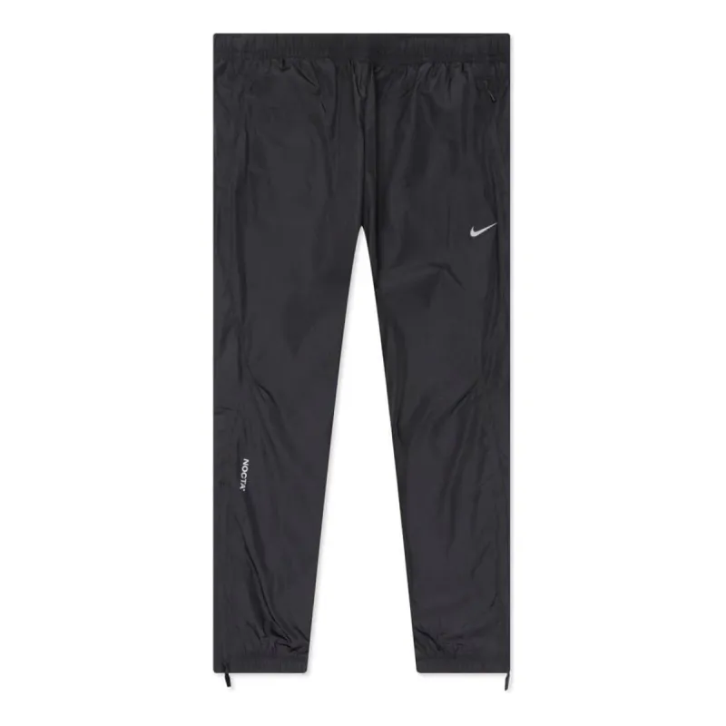 Nike x NOCTA Northstar Nylon Track Pants 'Anthracite Grey' FN7668-060 sold by KicksCrew