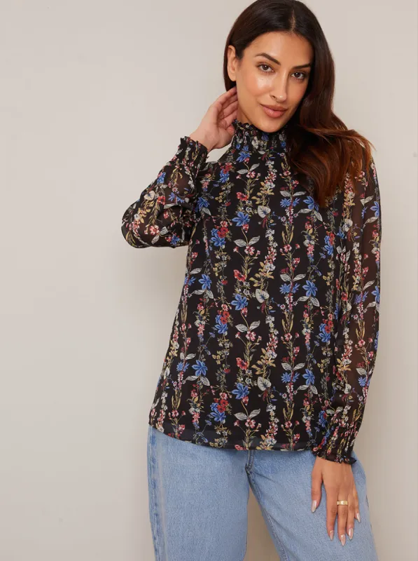 High Neck Long Sleeve Floral Blouse in Black sold by Chi Chi London