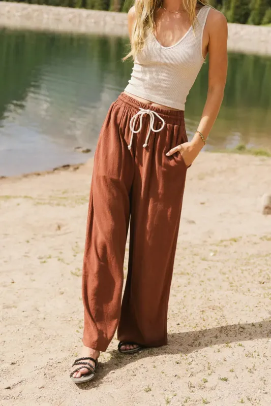 Nico Wide Leg Pants in Rust sold by bohme