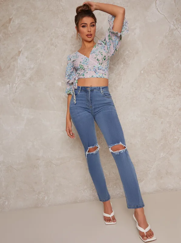 High Waisted Ripped Knee Slim Jeans in Blue sold by Chi Chi London