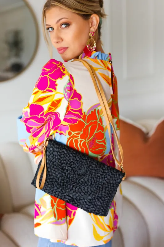 Black Raffia Woven Wrist Strap Clutch Bag sold by Charming Charlie