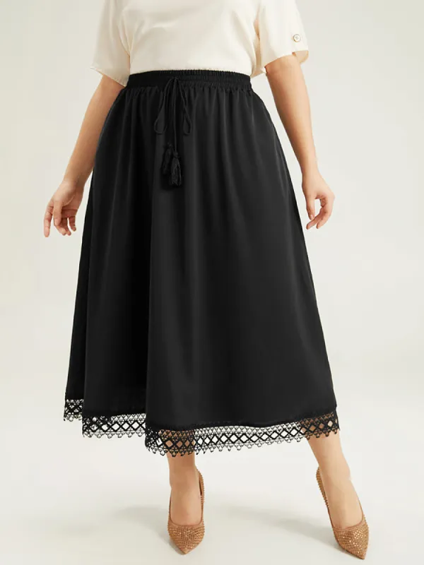 Lace Insert Pocket Ties Tassel Skirt sold by Bloomchic