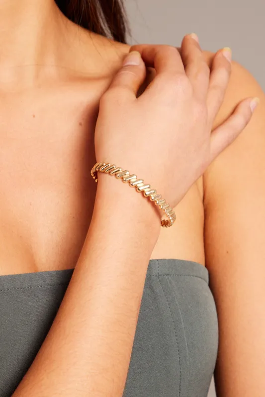 Gold Cuff Bracelet with Twist Design sold by Ally Fashion