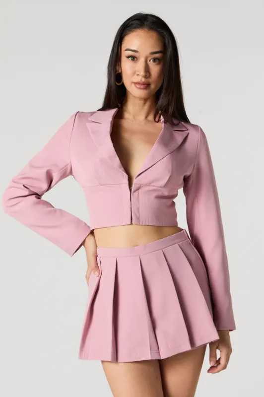 Blazer court avec agrafes sold by Urban Planet
