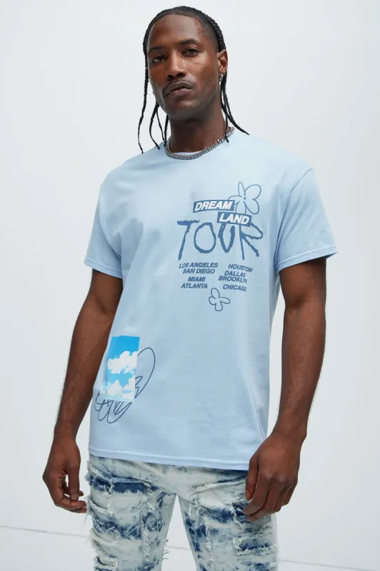 Dreamland Tour Short Sleeve Tee - Light Blue sold by Fashion Nova