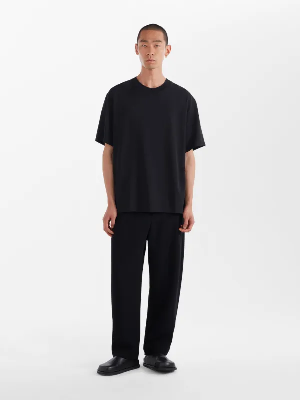 Lay T-Shirt in Black sold by Studio Nicholson