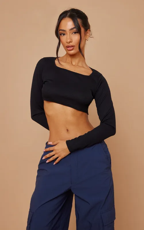 Petite Black Square Neck Ribbed Long Sleeve Crop Top sold by Pretty Little Thing