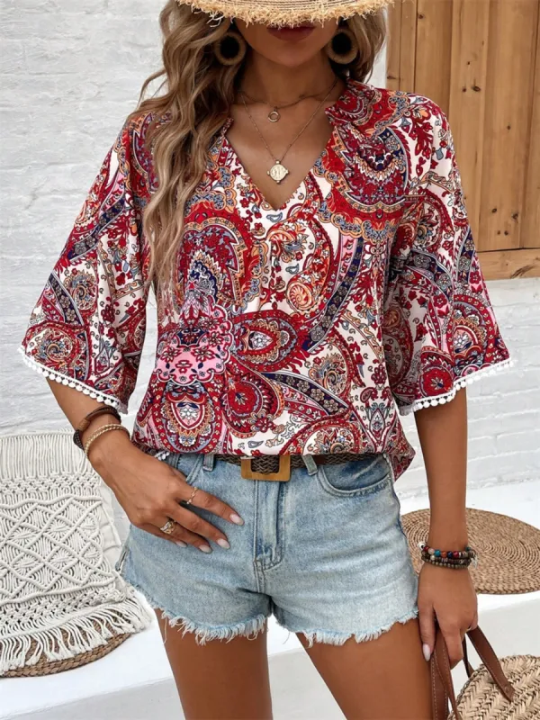 Printed Notched Half Sleeve Blouse sold by Charming Charlie