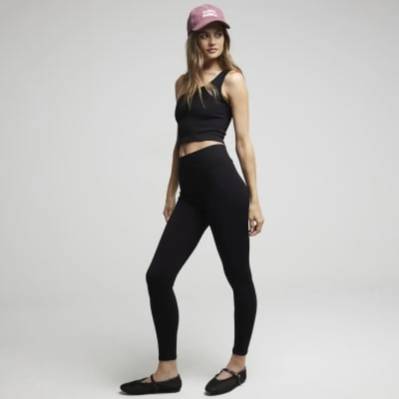 Black Seamless one shoulder crop top sold by River Island