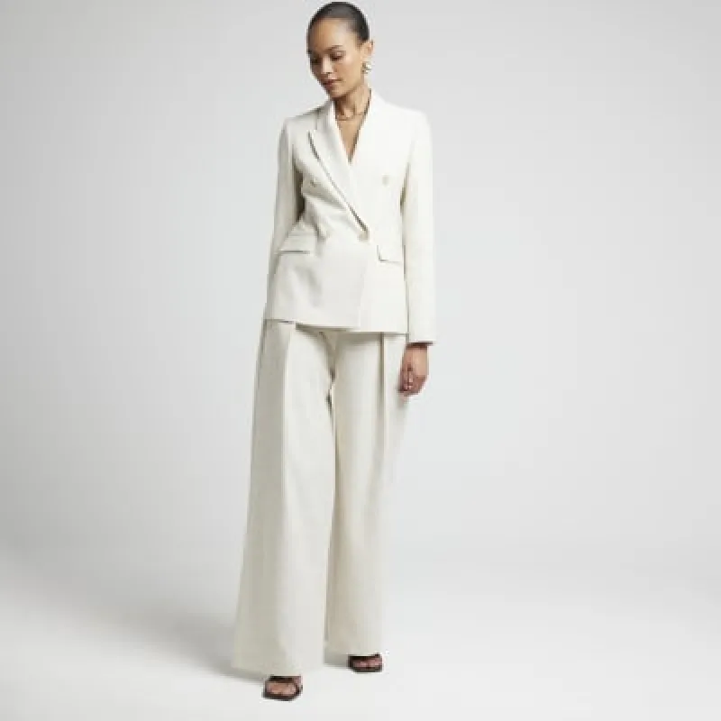 Beige linen blend wide leg trousers sold by River Island