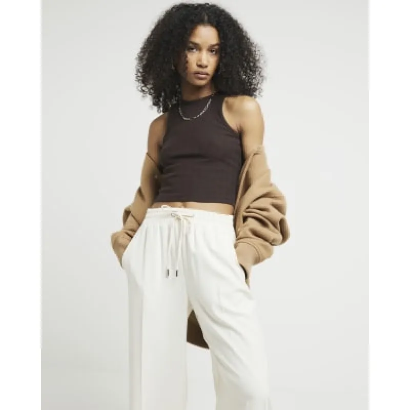 Brown ribbed crop tank top sold by River Island