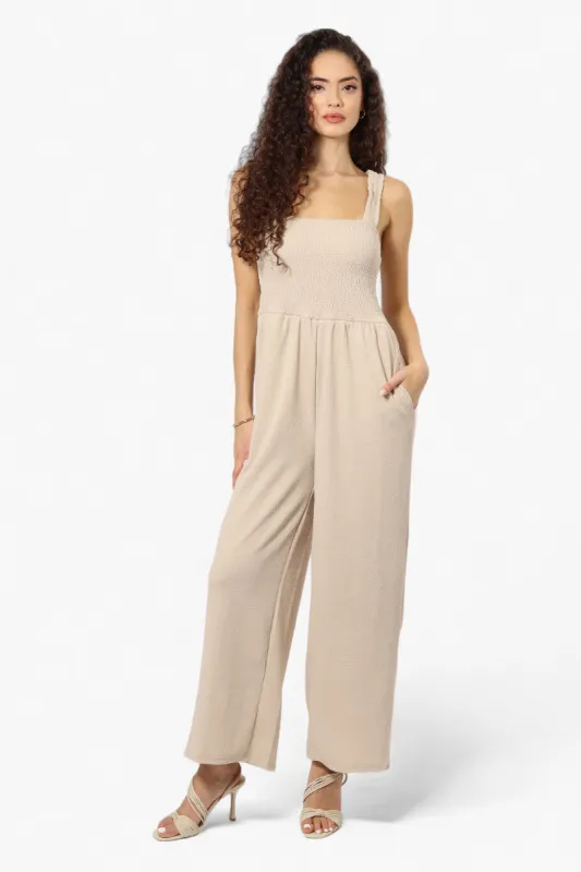 Impress Solid Smocked Top Jumpsuit - Cream sold by Fairweather