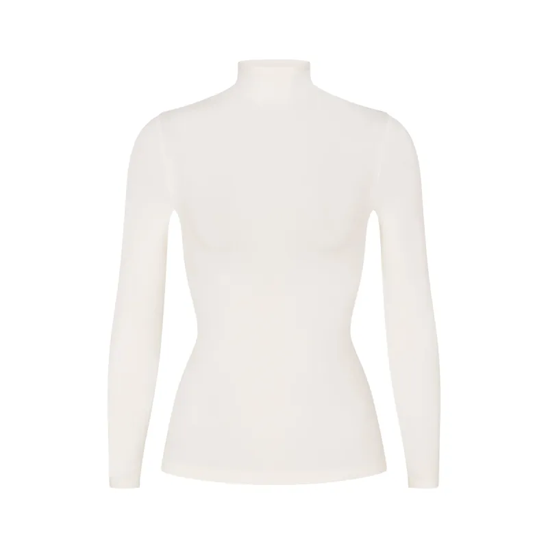 SOFT SMOOTHING SEAMLESS TURTLENECK TOP | MARBLE sold by SKIMS