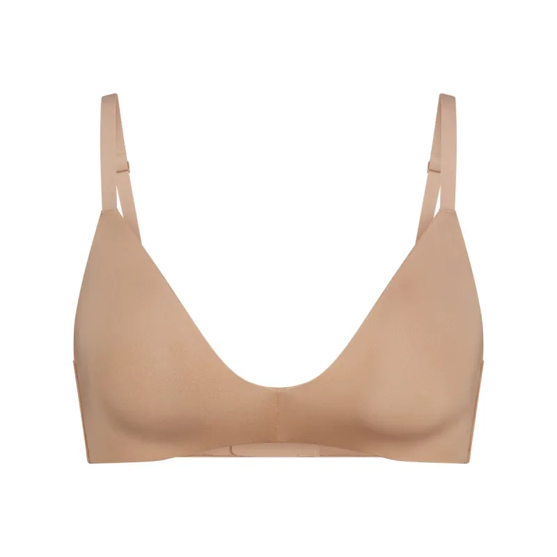 WIRELESS FORM T-SHIRT DEMI BRA | CLAY sold by SKIMS