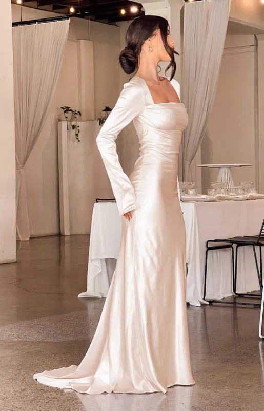 Addina Cream Long Sleeve Maxi Dress sold by Beginning Boutique