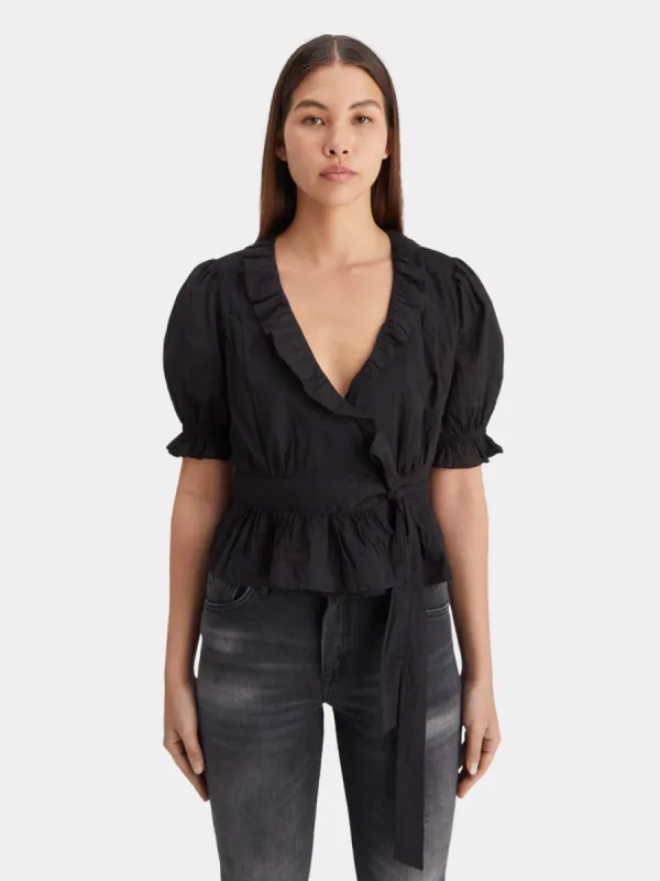 Ruffle wrap top sold by Scotch and Soda